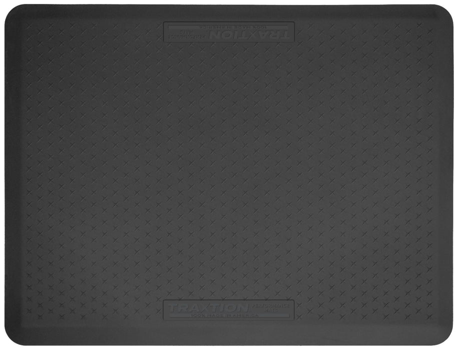 Above view of the top of a black Traxtion mat.